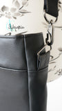 Sofortkauf Handtasche mit raffiniertem Detail in schwarz-weiß